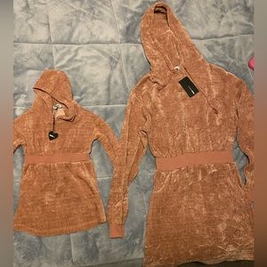 New!!  Mommy & me matching hoodie sweater dresses. Purchased by Fashion Nova